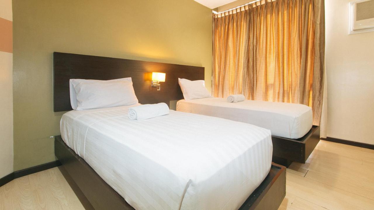 Lorenzzo Suites Hotel Makati City Bagian luar foto
