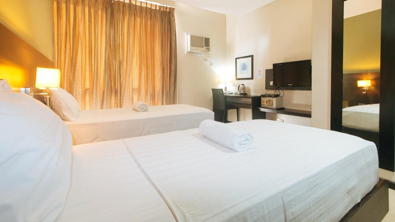 Lorenzzo Suites Hotel Makati City Bagian luar foto