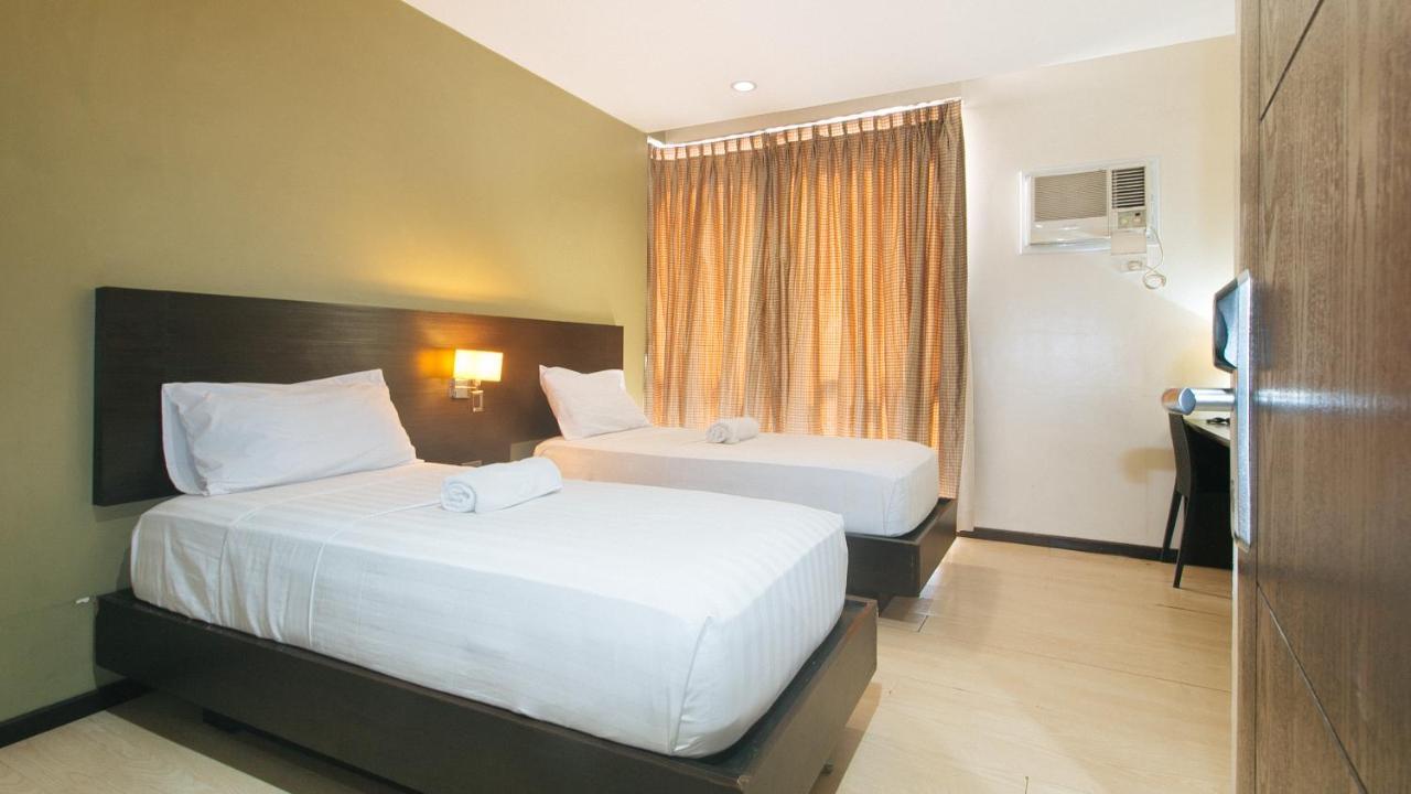 Lorenzzo Suites Hotel Makati City Bagian luar foto
